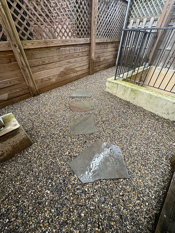 The full-color irregular bluestone slabs create a relaxed, casual, earthy vibe instead of a stiff design.