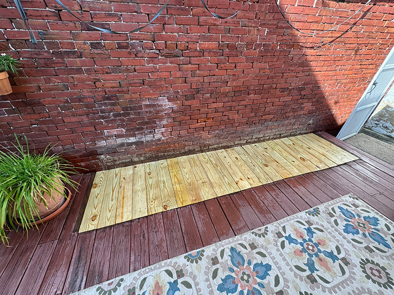 Deck extension/repair to fill in where heights of bamboo once grew.