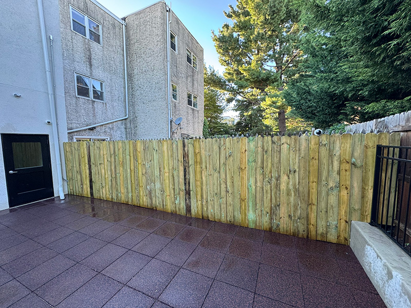 Fishtown Montessori School gets a new fence, for their new building.