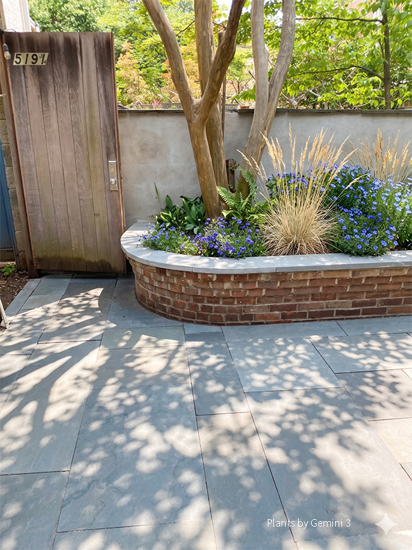 Natural bluestone and brick, makes a stunning combo. Architects: Heima Studio