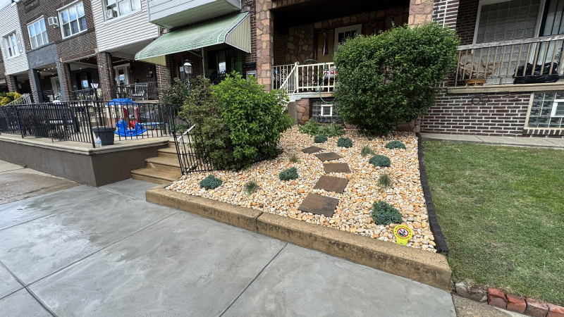 Deciding to ditch the grass, these Bridesburg homeowners opt for a xeriscaping effect.